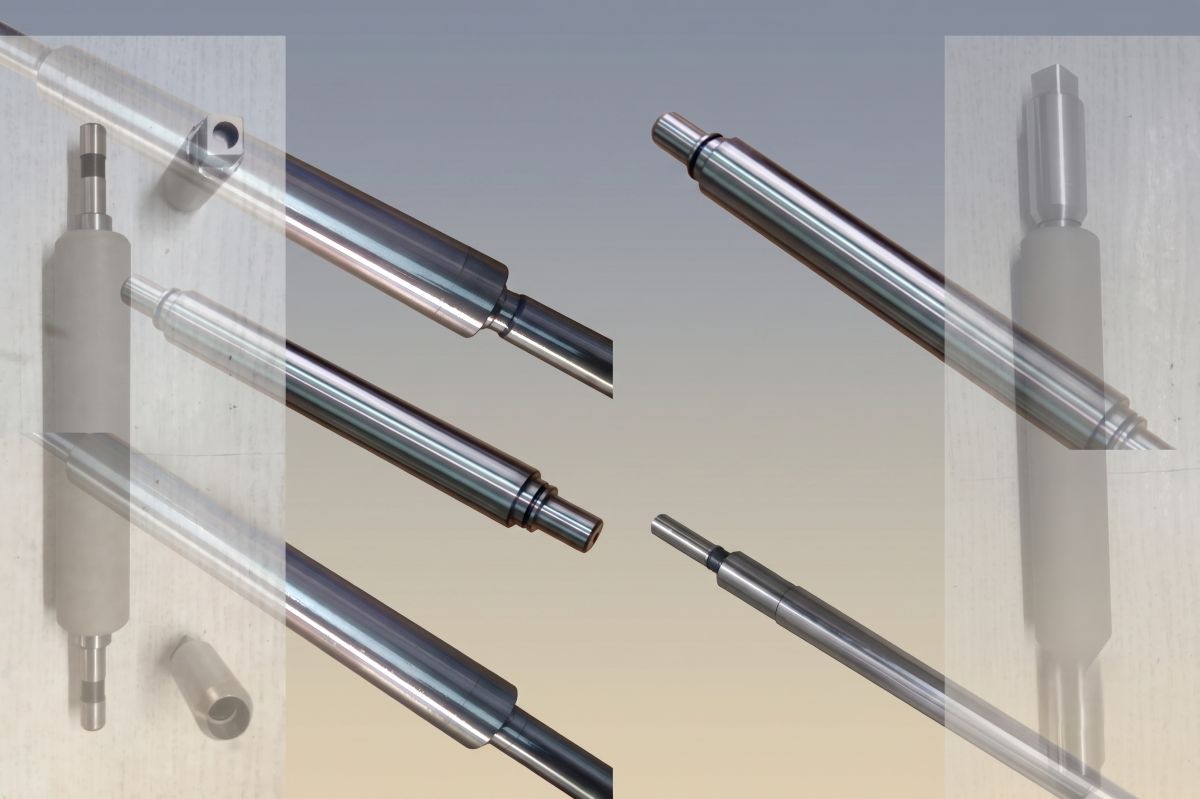 Drawframe top rollers with end bushes for drawframe and comber drafting systems